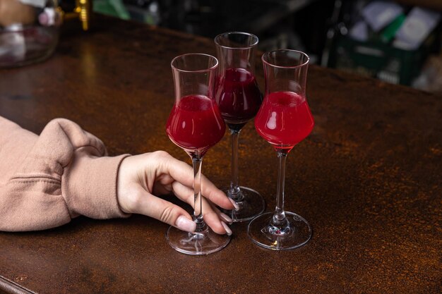 Beautiful and delicious alcoholic cocktails prepared at the bar by the bartender