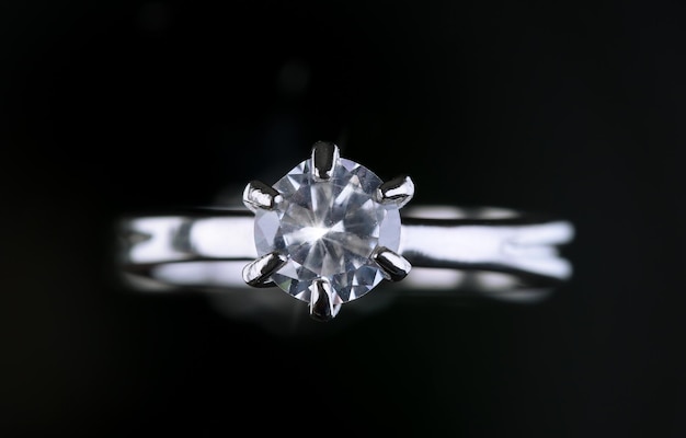 Beautiful diamond ring on gray background