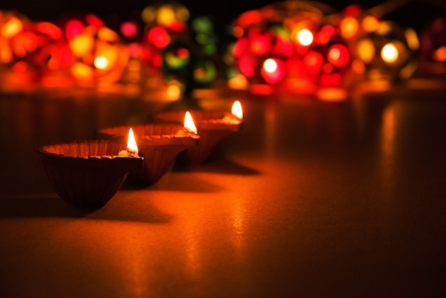 Beautiful diwali lighting or diya or clay oil lamp, selective focus