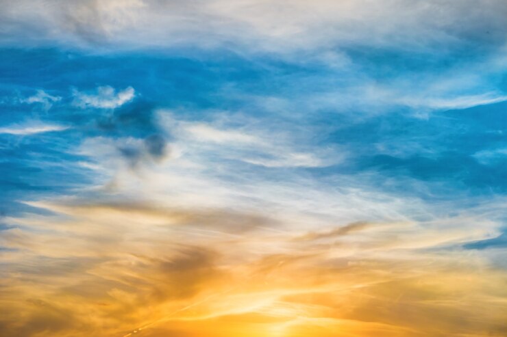 Beautiful dramatic sunset with sun and clouds