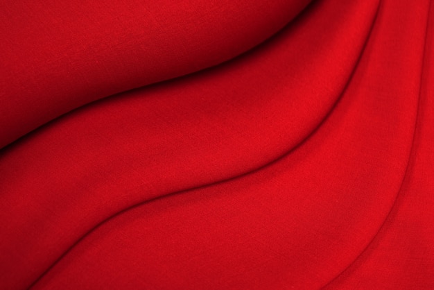 Foto bellissimo tessuto drappeggiato di lana rossa