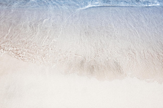 Beautiful drawing on the sand of the sea background