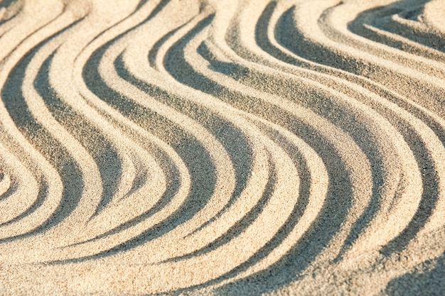 Фото Красивые рисунки на песке морского берега
