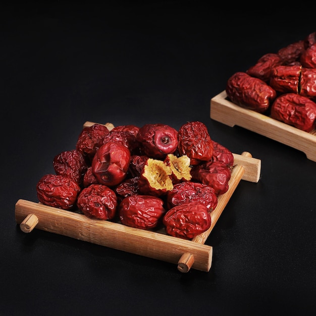 Beautiful dried red apple on a black background