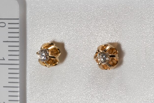 Beautiful earrings with natural diamonds  carats each jewelry with a yellow gold frame in the shape ...