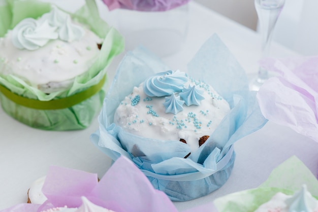 Beautiful Easter cakes on a decorated light table