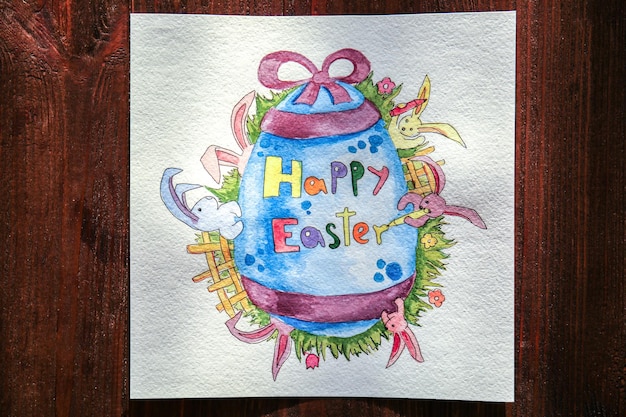 Beautiful Easter greeting card on wooden table