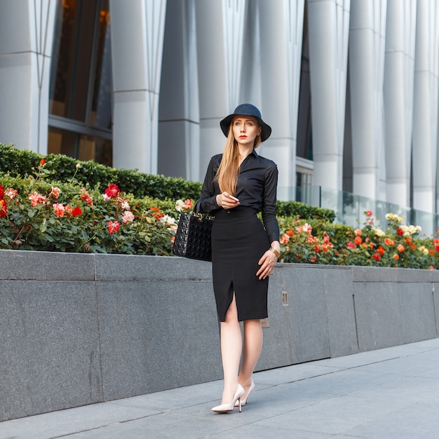 Beautiful elegant woman in a stylish hat