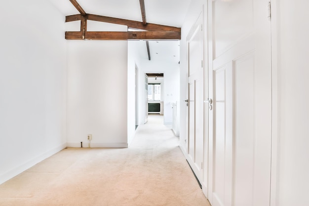 Beautiful empty hallway with white doors