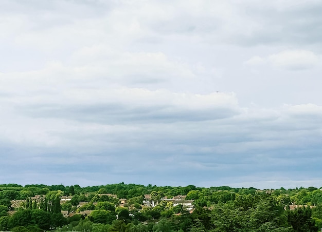 Beautiful English countryside landscape in Hertfordshire England United Kingdom green foliage villages and cloudy sky weather and nature