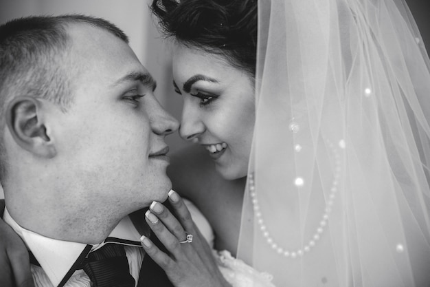 Beautiful european bridal couple in the hotel room