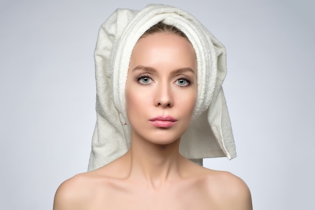 Beautiful european woman handle towel, after bath