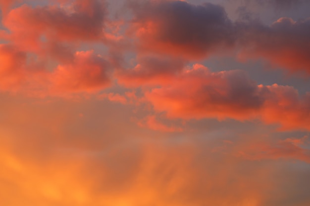 Beautiful evening sky with clouds at sunset. High quality photo