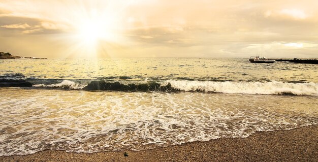 Beautiful evening sun and clouds over the sea