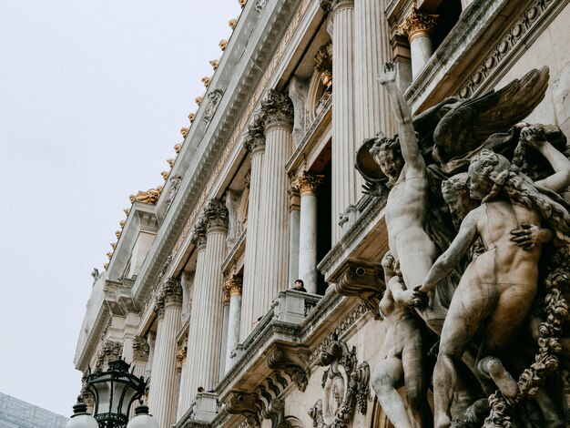 Beautiful facade of Grand Opera in Paris with sculptures 