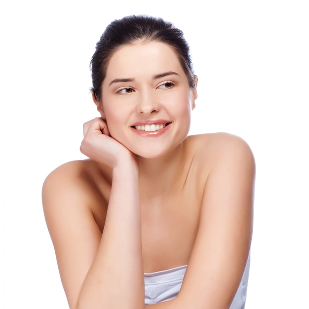 Beautiful face of young adult woman with clean fresh skin 