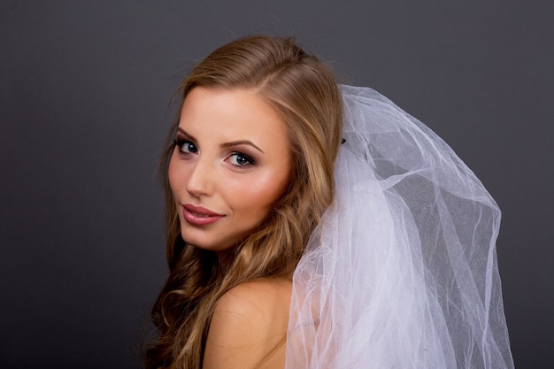 Beautiful face of young adult woman with clean skin