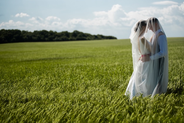 Beautiful fashion bride and groom on the wedding day