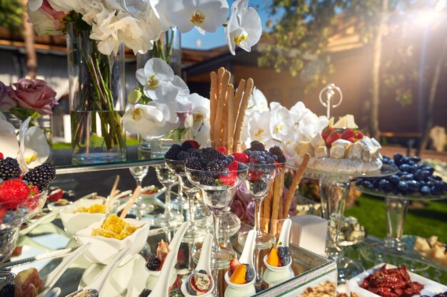 Beautiful festive buffet with flowers and food