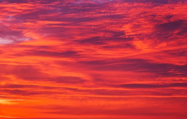 Beautiful fiery orange sky during sunset or sunrise.