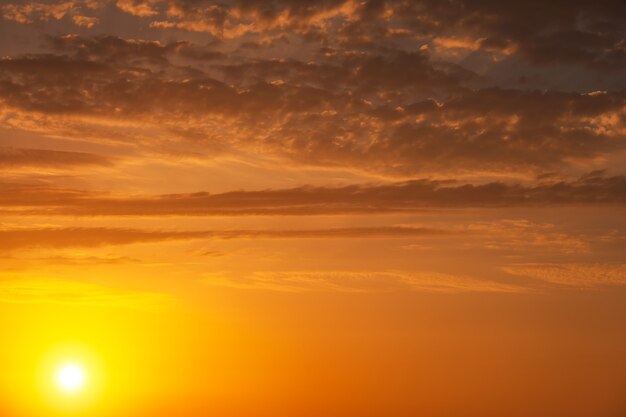 Beautiful fiery orange sunset sky as background