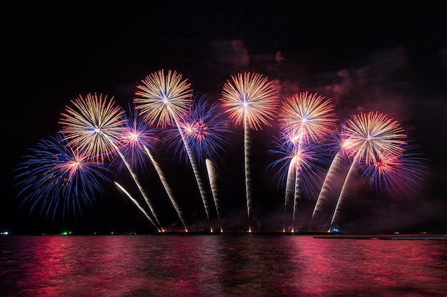 Beautiful firework display for celebration over the sea