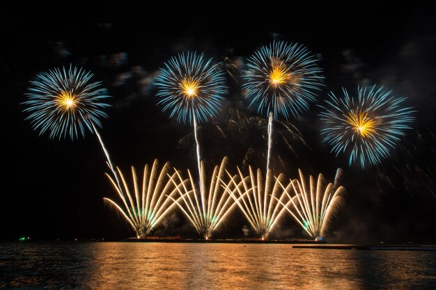 Beautiful firework display for celebration over the sea