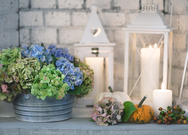 Beautiful floral arrangement with lanterns and candles