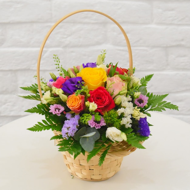 Beautiful flower basket on a table