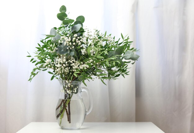 beautiful flower bouquet on a white table with a white background