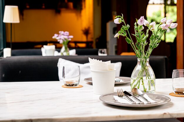 beautiful flower in vase on dinning table