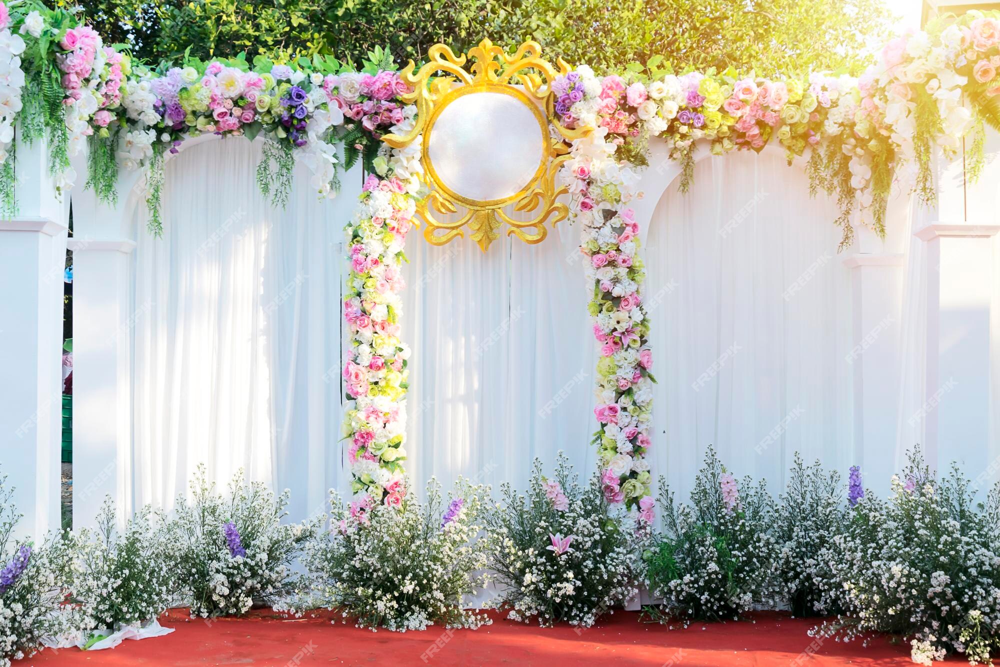 Premium Photo | Beautiful flowers background for wedding scenehappy outdoor  wedding ceremony scene for a summer mountain weddingdecorated wedding alter  and flower decorations with mountains in the background