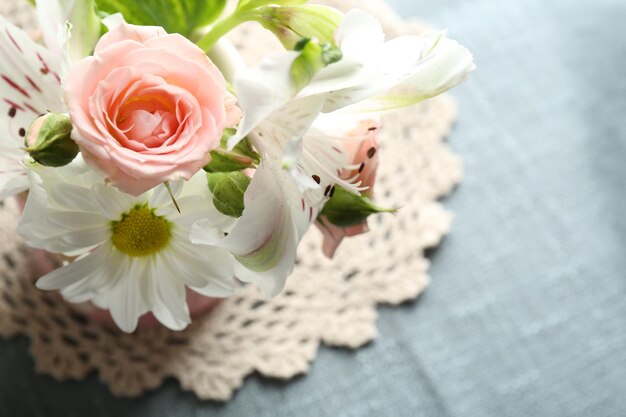 Beautiful flowers on table close up