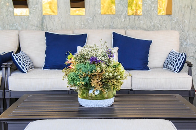 Beautiful flowers in vase on table 