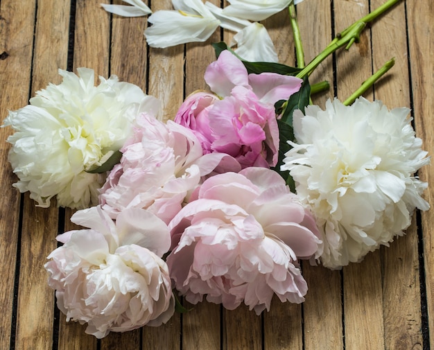 beautiful flowers on wooden table, various , place for text, closeup