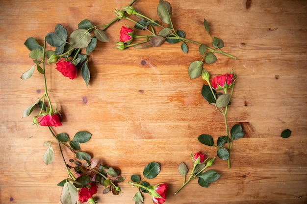 Beautiful flowers on the wooden table. The work of the florist. Flower delivery.