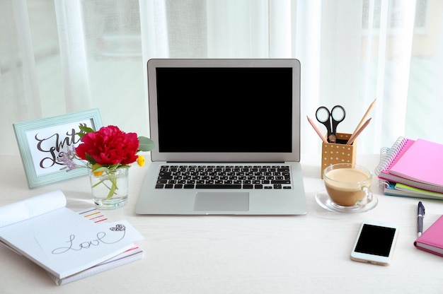 Beautiful fragrant flowers as floral decoration on workplace