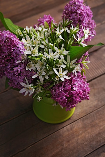 Beautiful fresh bouquet on wooden background