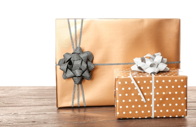 Beautiful gift boxes on table against white