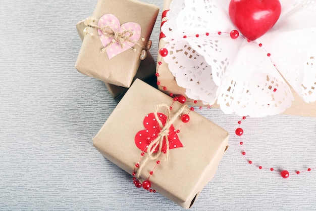 Beautiful gifts on grey background. Valentine Day concept