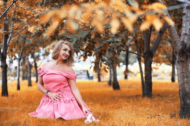 Beautiful girl in the autumn park