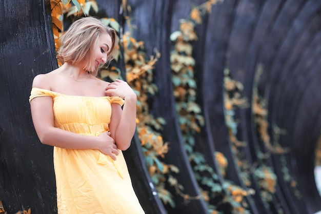 Beautiful girl in the autumn park