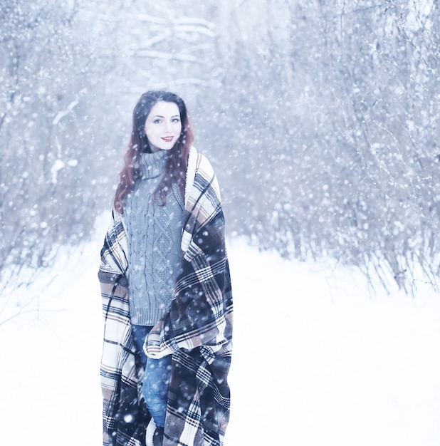 Beautiful girl in a beautiful day winter snow park