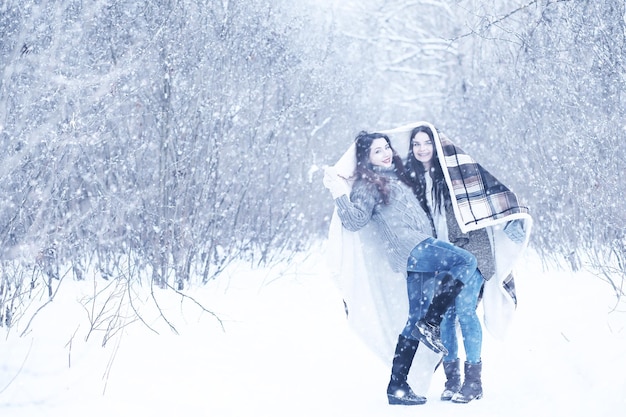 Beautiful girl in a beautiful winter snow