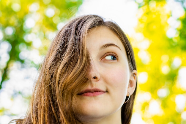 Beautiful girl, brown hair. Natural beauty. Nature.