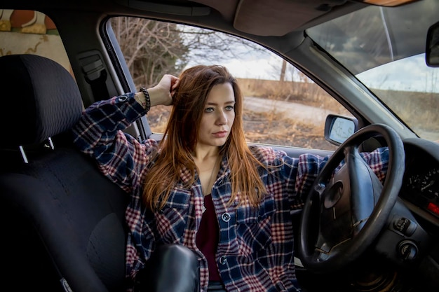 Beautiful girl in the car