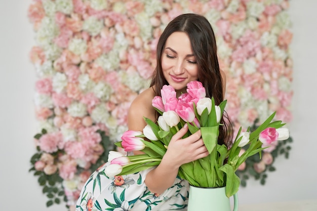 Beautiful girl on floral background.