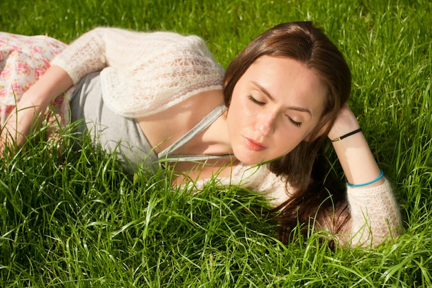 Beautiful girl on grass 