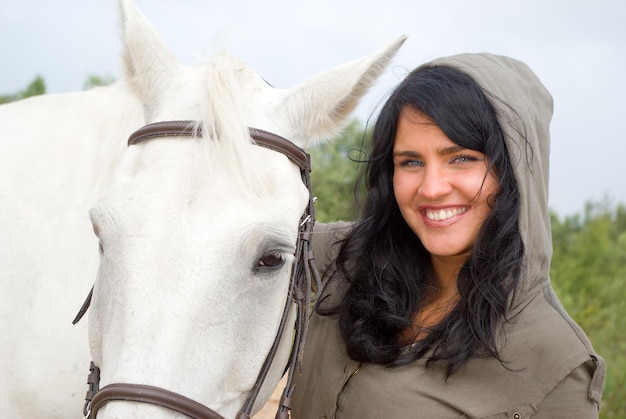 Photo beautiful girl and horse