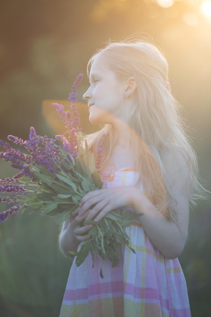 Beautiful girl on the meadow